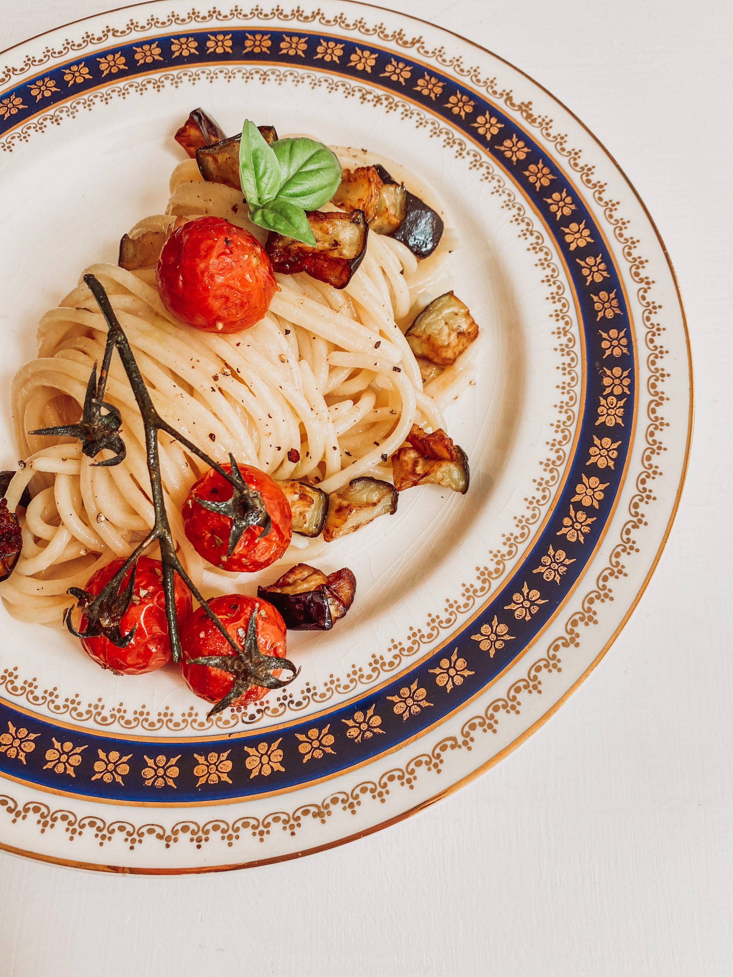 Spaghetti with parmigiano cream, fried eggplants and confit cherry tomatoes - Annapaola D'Alessio